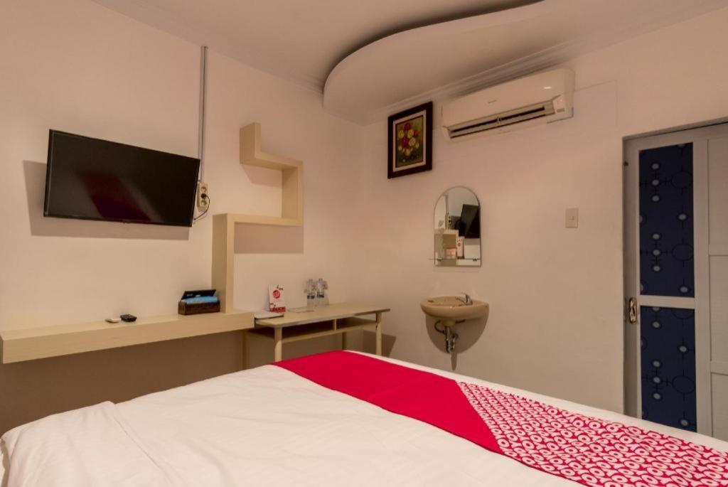 Oyo 619 Naufal Syariah Hotel