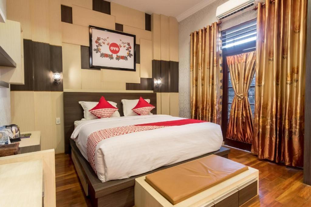 Oyo 619 Naufal Syariah Hotel 2*
